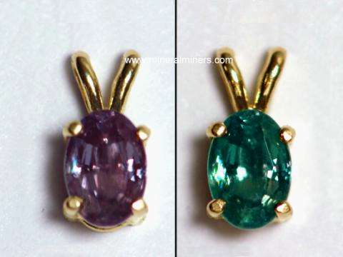 link to page displaying handcrafted jewelry of <em>ALL</em> Minerals (image is of a natural alexandrite pendant in 14k gold showing its color-change)