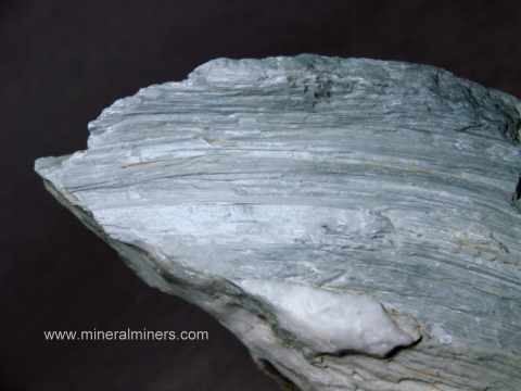 link to page displaying Lapidary Grade Rough of <em>ALL</em> Minerals (cats eye quartz lapidary grade rough specimen shown)