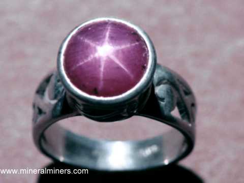 Star sapphire ring with diamond accents in 14k white gold